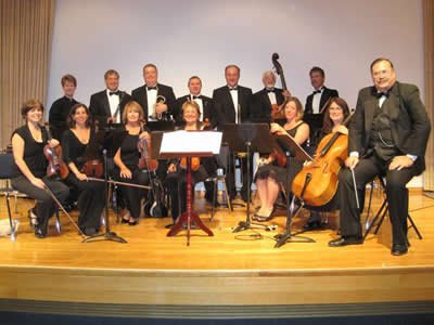 Carli (far right) with the Flower City Society Orchestra