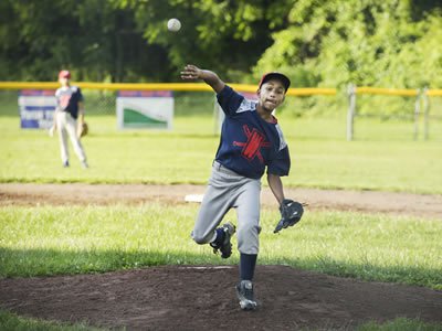 Jondale Dávila, 12, is a star pitcher for Syracuse Parks and Recreation's District 8 Little League Baseball. (Photo by Marilu Lopez Fretts)  