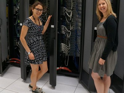 The University’s 300 tera-FLOP supercomputer benefits an array of workers involved with the Advanced LIGO project, including Samantha Usman ’16, left, and research scientist Laura Nuttall.