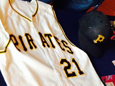 Roberto Clemente's helmet and jersey, at the National Museum of American History. The Puerto Rican-born right fielder played 18 seasons with the Pittsburgh Pirates, before his untimely death in 1972.