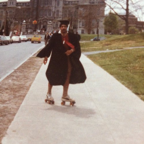 graduate on roller skates