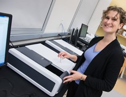 Chemistry professor Tara Kahan with one of the department's new spectrometers