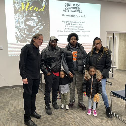 Patrick W. Berry with Mend editor Freddie Jackson and his family.