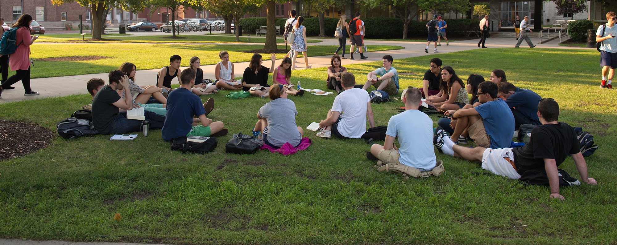 Holding class outside on Shaw Quadrangle